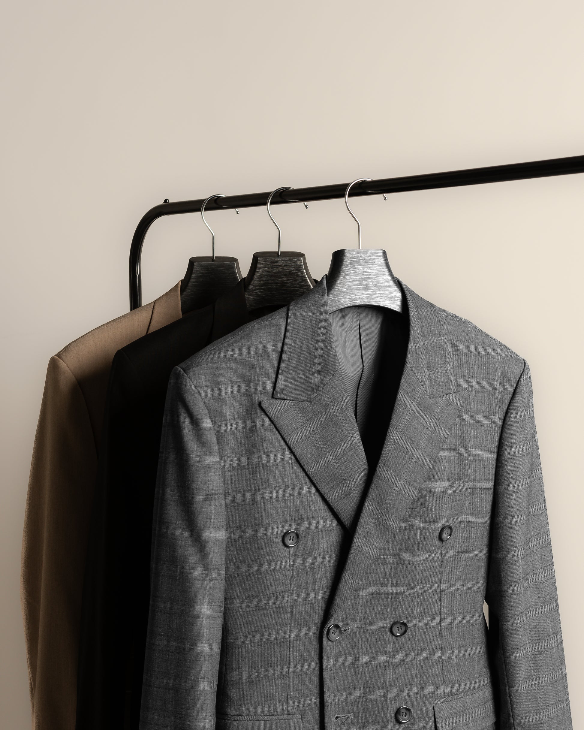 suits-on-rack-grey-nineteen95