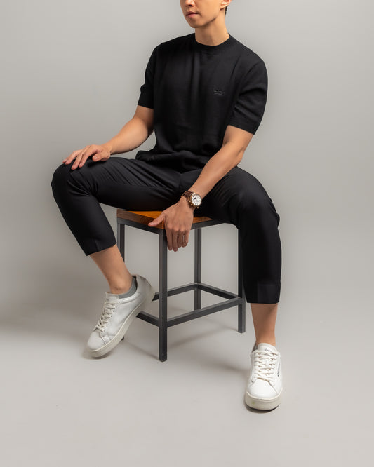 knitted-plain-tee-black-productshot-seated-nineteen95