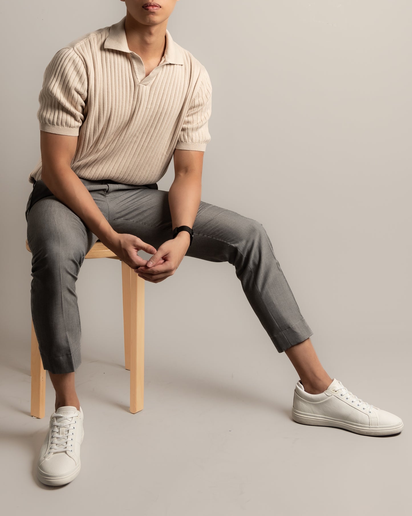 knitted-strip-polo-tee-beige-productshot-seated-nineteen95